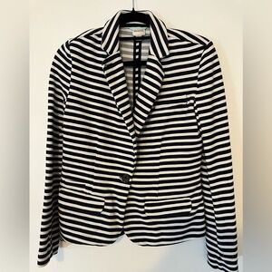 Navy blue and white cardigan .